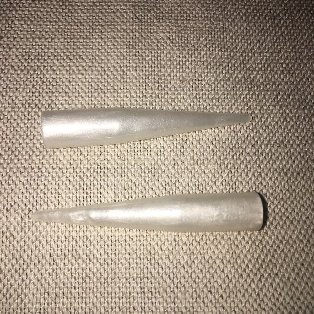 Creamy pearl colored size zero stretchers